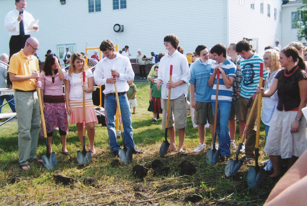 Students breaking ground for the new Intersection building.